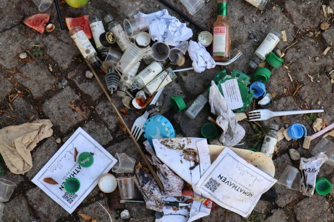 waste strewn on the floor in a street